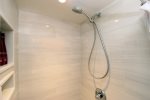Handheld shower head for rinsing of the little ones after a day at the beach